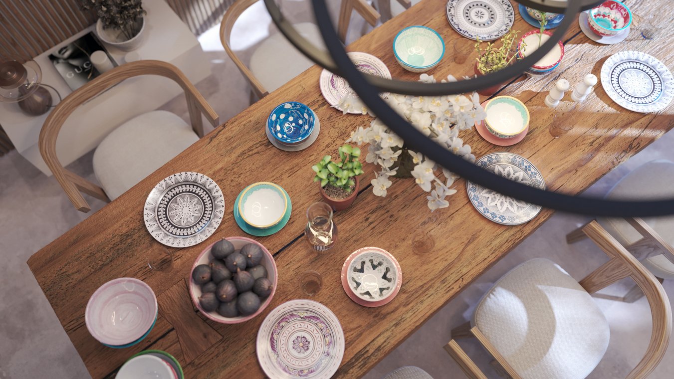 Detailed 3D Visualization of the dining table in the Blue Elements project, adorned with colorful ceramic bowls, fresh fruit, and white orchids.