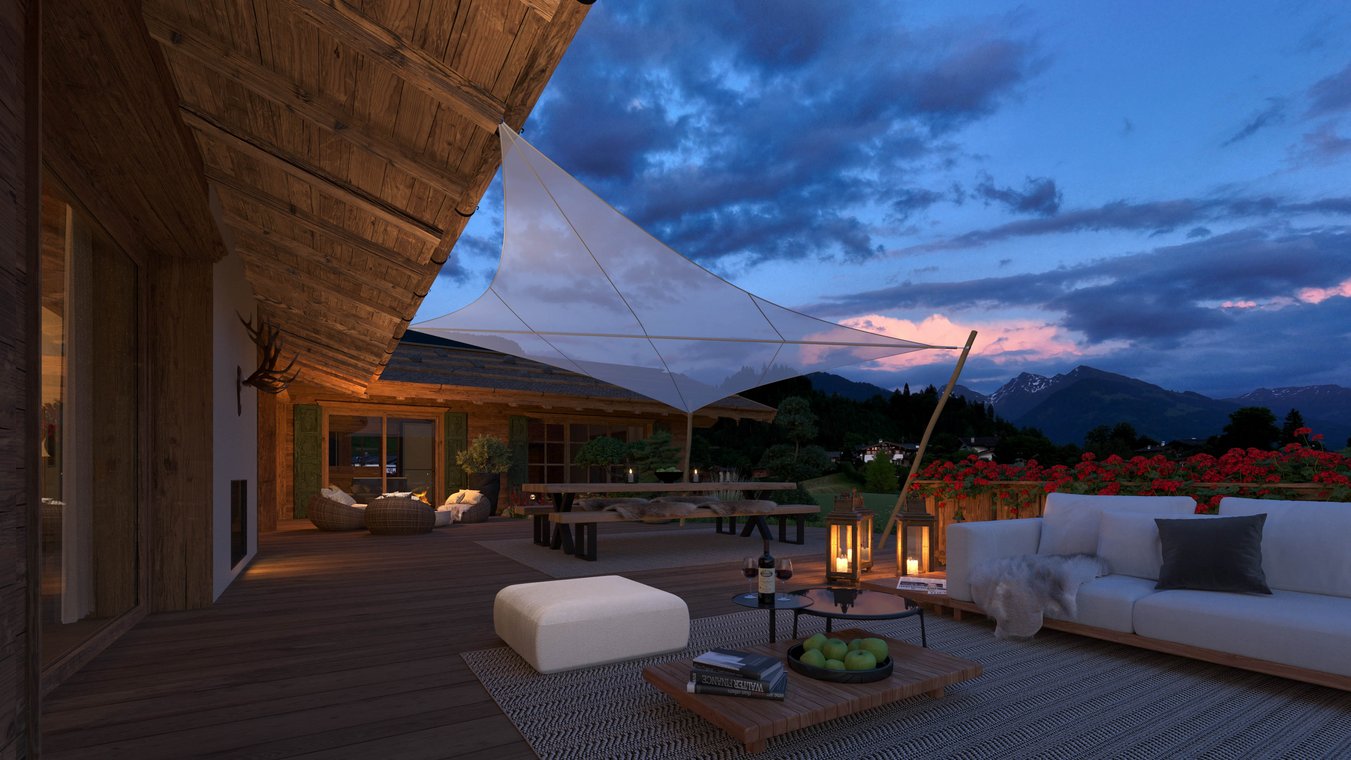 3D Visualization of a luxury chalet terrace in Kitzbühel at dusk, featuring cozy sofas, lanterns, and panoramic Alpine views.