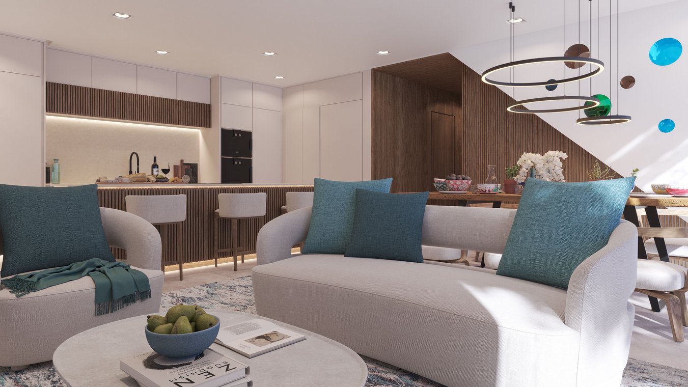 Photorealistic 3D Visualization of the living area in the Blue Elements project with light sofas, turquoise cushions, and elegant kitchen in the background.