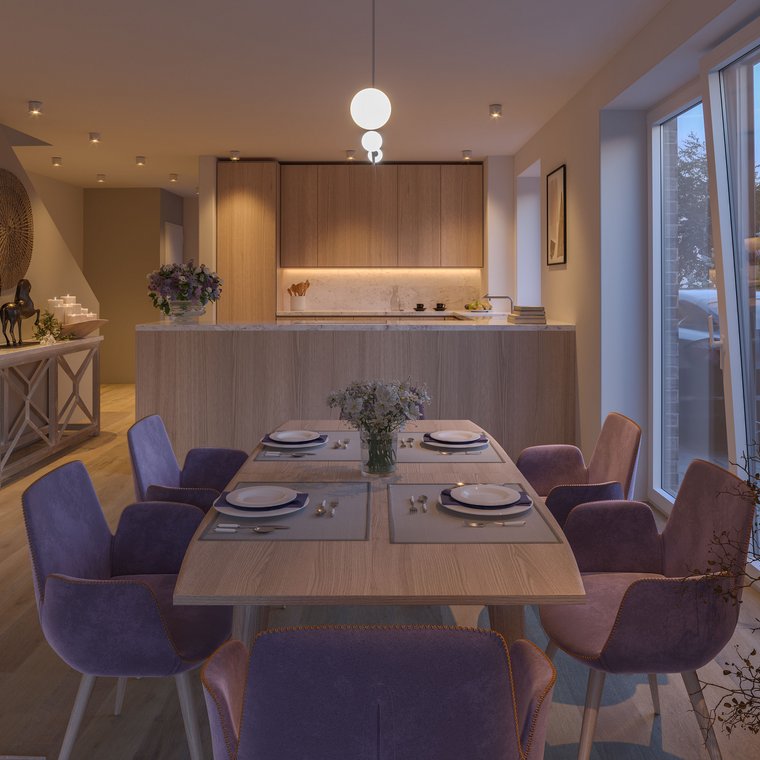 Dining area with elegant chairs and direct access to the modern kitchen.