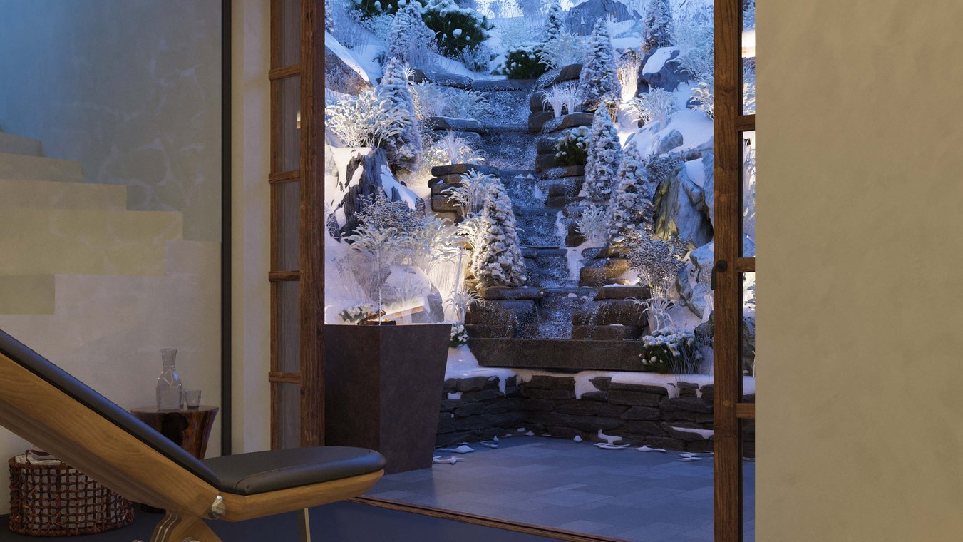 3D Visualization of an alpine wellness lounge with views of a snowy waterfall and illuminated winter scenery, created by gmsvision.
