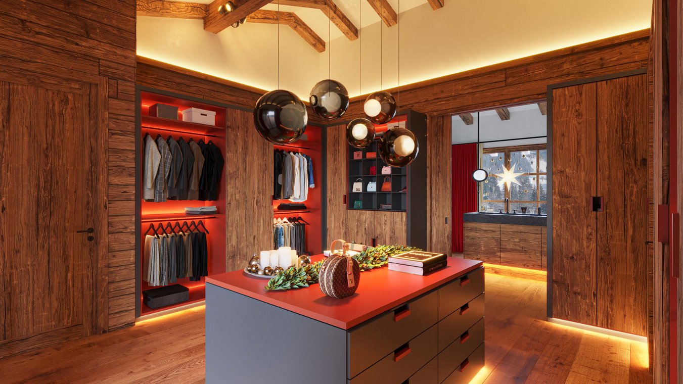 3D Visualization of a modern walk-in closet with tailored suits, central island, and elegant lighting.